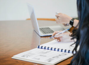 startup founder taking notes