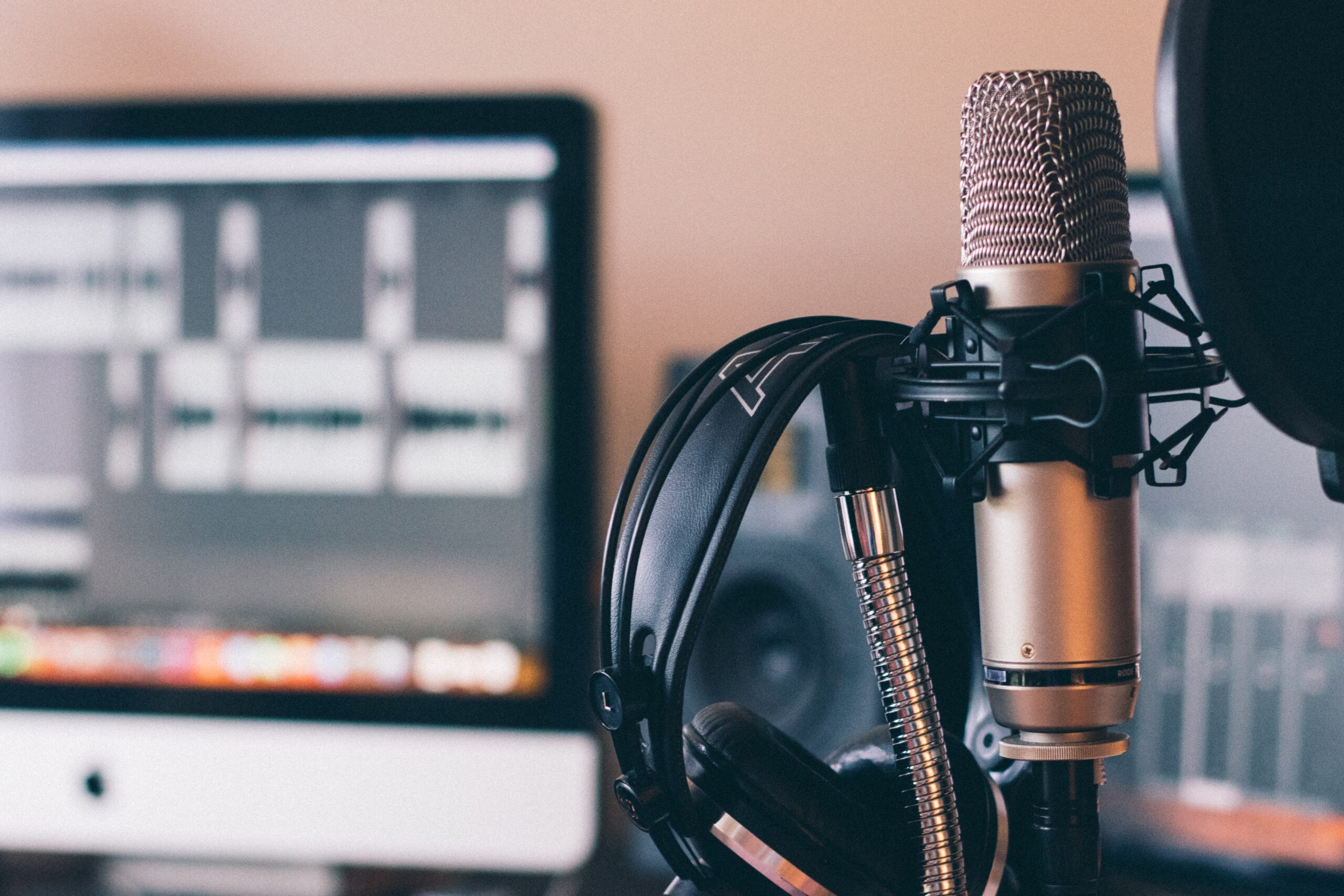 podcast station with imac headphones and microphone