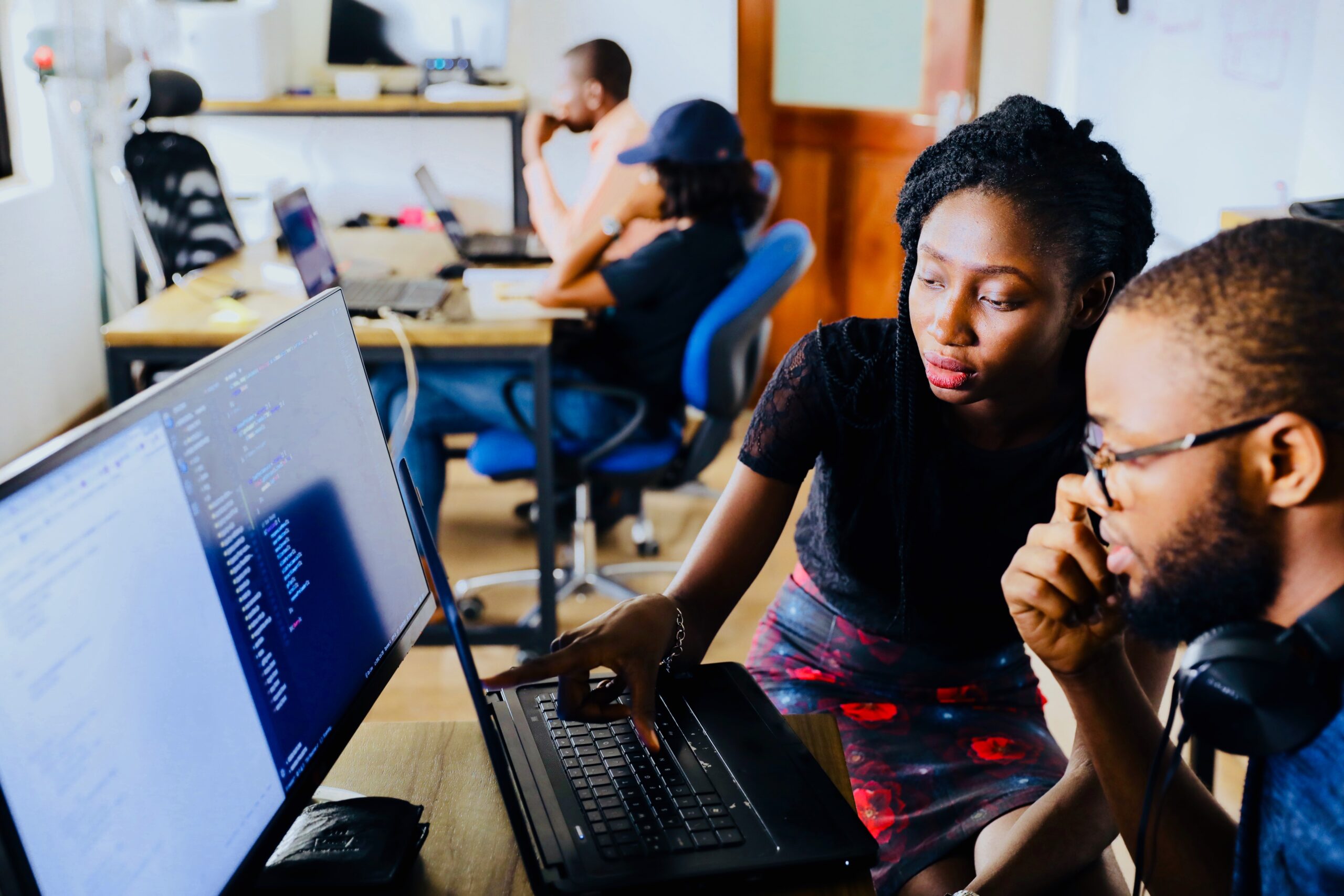 Young Black students coding - cybersecurity competition for high school students