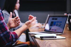 Workers having a meeting - Economic downturn blog