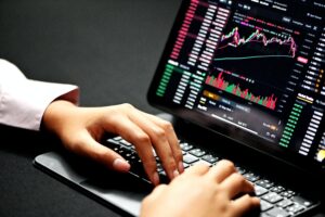 iPad screen with stock market metrics - Economic downturn blog
