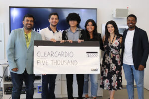 DMZ Basecamp 2023 participants, ClearCardio, pose with their $5000 cheque