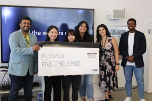 The PilotASD team poses with their $5000 cheque